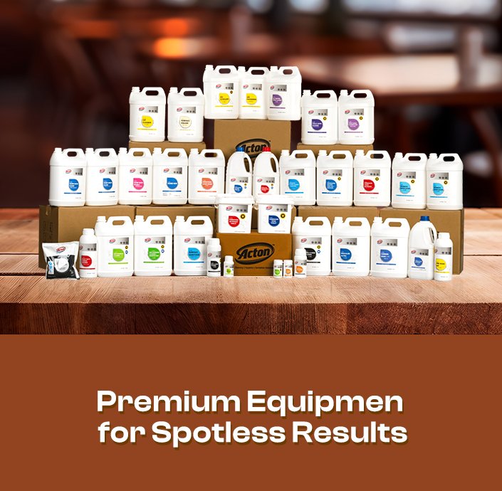 Array of cleaning products on a wooden table, featuring bottles and boxes with colorful labels. Text below reads, "Premium Equipment for Spotless Results."