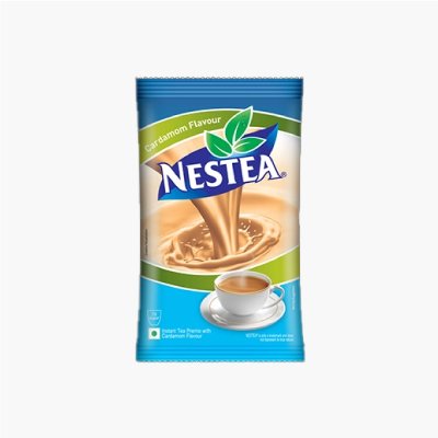 Pack of Nestea cardamom flavor tea on a white background. The design shows tea being poured into a cup, with fresh green leaves in the logo.